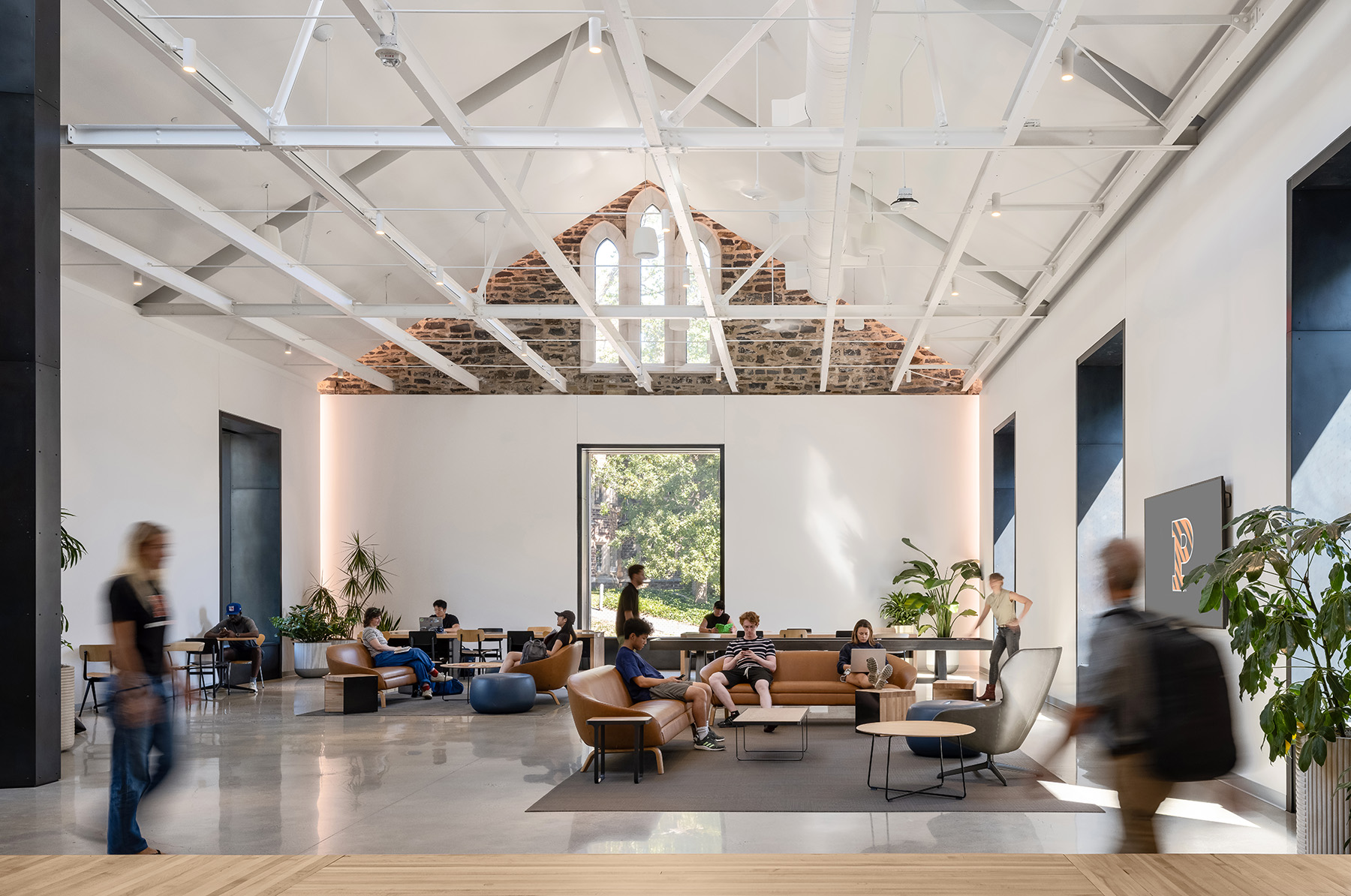 Lounge area with recessed perimeter lighting outlining the architecture and creating a soft ambient glow.